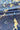 A close-up of draped fabric with a bold floral pattern in navy blue and warm cream.