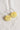 A pair of handmade hoop earrings with round, translucent yellow 