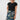 a black short-sleeve top and a knee-length navy skirt with a multicolor abstract cloud-like pattern,