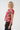 sun and clouds red oilve top