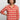 Woman wearing a red floral patterned shirt on a plain background